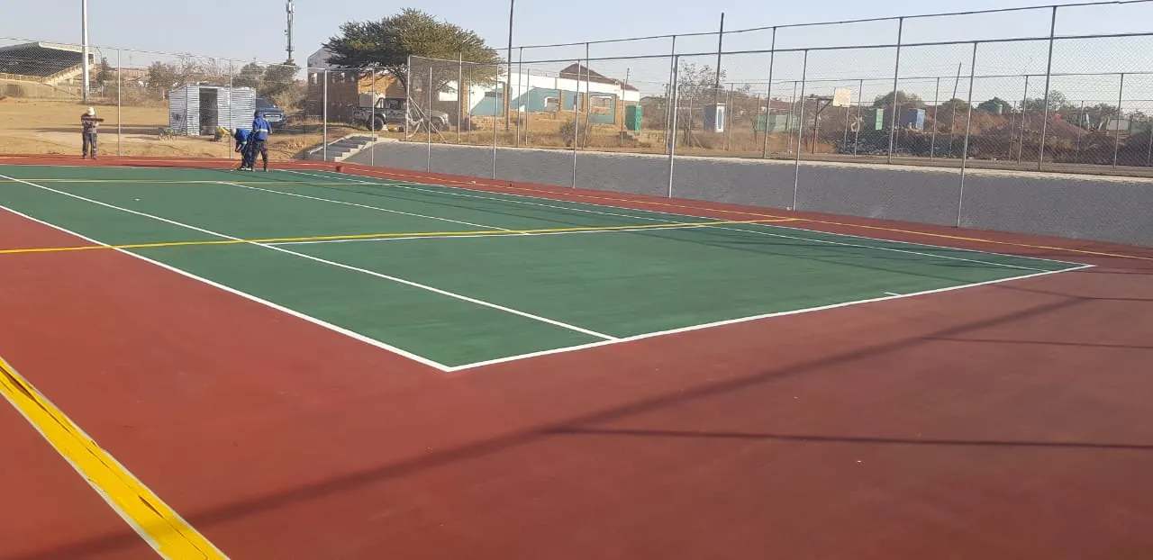 Sports court surfacing